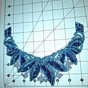 Turquoise bead and sequin neckline applique